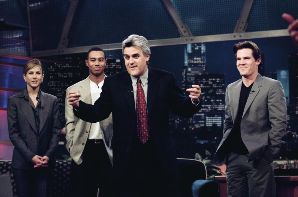 THE TONIGHT SHOW WITH JAY LENO -- Episode 1360 -- Air Date 04/17/1998 -- Pictured: (l-r) Actress Jennifer Aniston, professional golfer Tiger Woods, host Jay Leno, actor Josh Brolin onstage April 17, 1998  (Photo by Margaret C. Norton/NBC/NBCU Photo Bank via Getty Images)