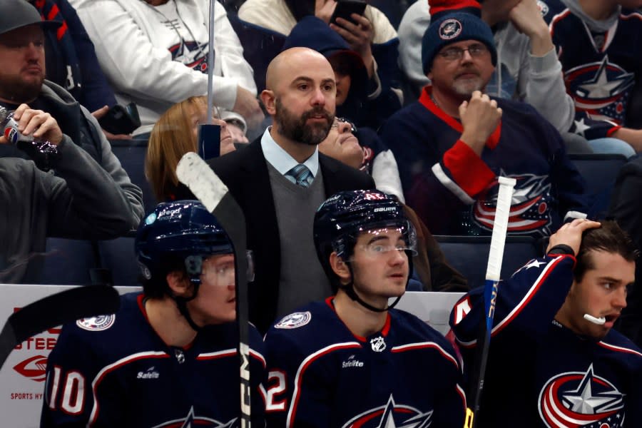 Columbus Blue Jackets coach Pascal Vincent watches his team against the Florida Panthers during an NHL hockey game in Columbus, Ohio, Sunday, Dec. 10, 2023. The Panthers won 5-2. (AP Photo/Paul Vernon)