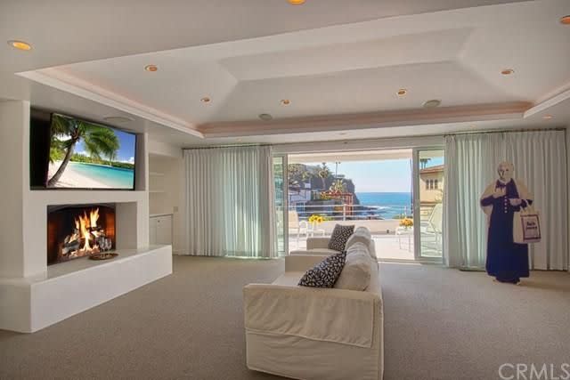 Mary See of See's Candy stands guard in Warren Buffett's beach house