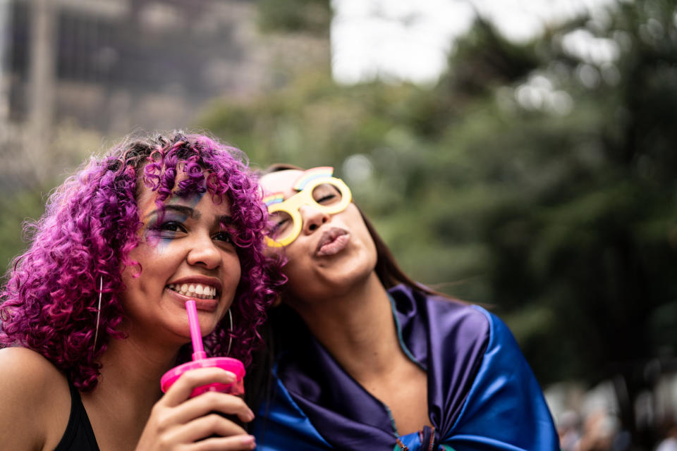 two people at a pride parade