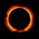 In this handout provided by NASA, sun spots are seen as the moon moves into a full eclipse position after reaching annularity during the first annular eclipse seen in the U.S. since 1994 on May 20, 2012. Differing from a total solar eclipse, the moon in an annular eclipse appears too small to cover the sun completely, leaving a ring of fire effect around the moon. The eclipse is casting a shallow path crossing the West from west Texas to Oregon then arcing across the northern Pacific Ocean to Tokyo, Japan. (Photo by JAXA/NASA/Hinode via Getty Images)