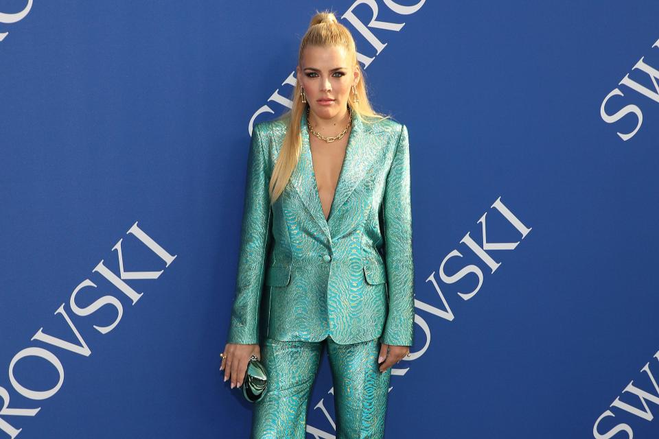 Busy Phillipps in a blue suit