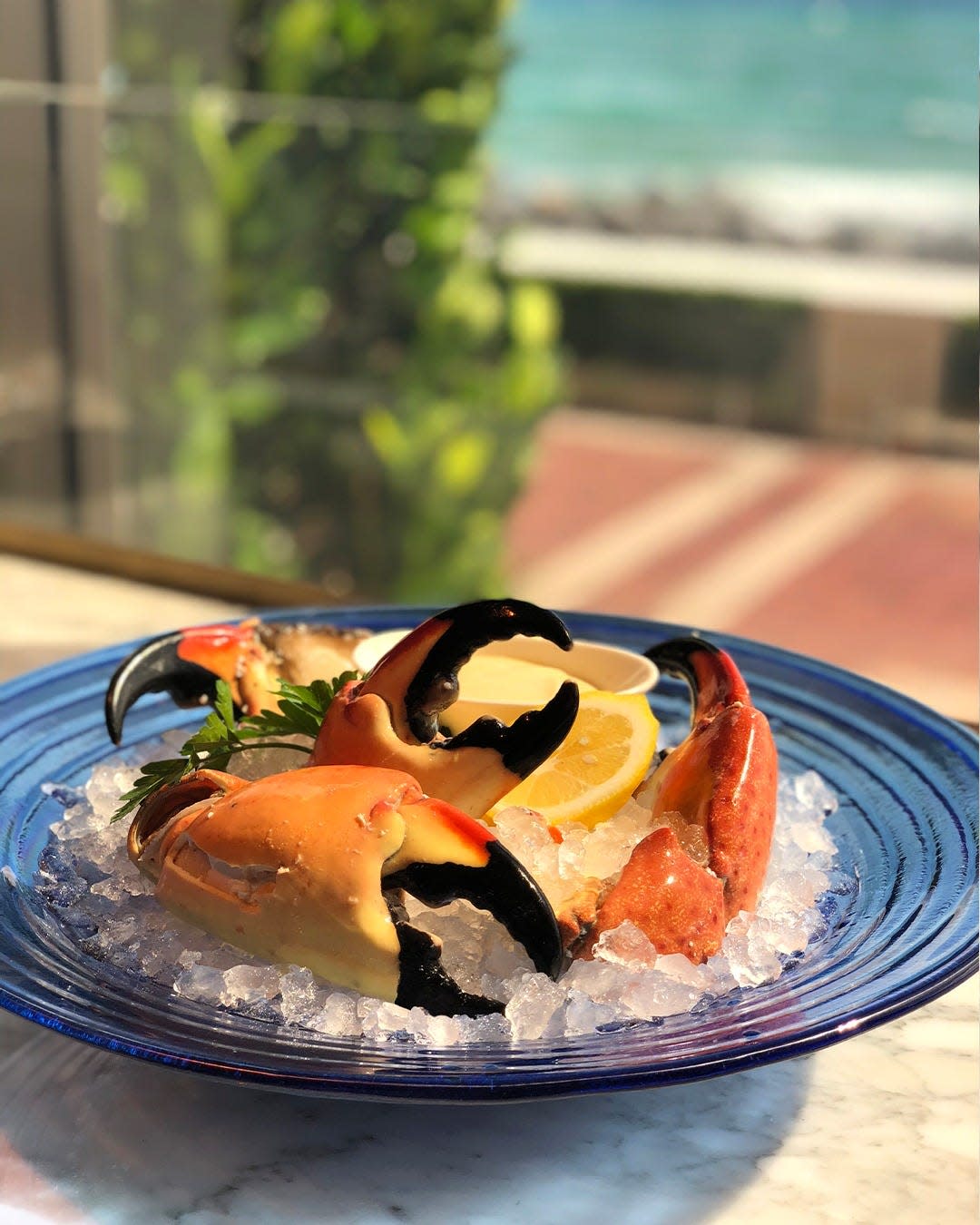 Stone crab claws at The Breakers' The Seafood Bar are served with a house-made mustard sauce.