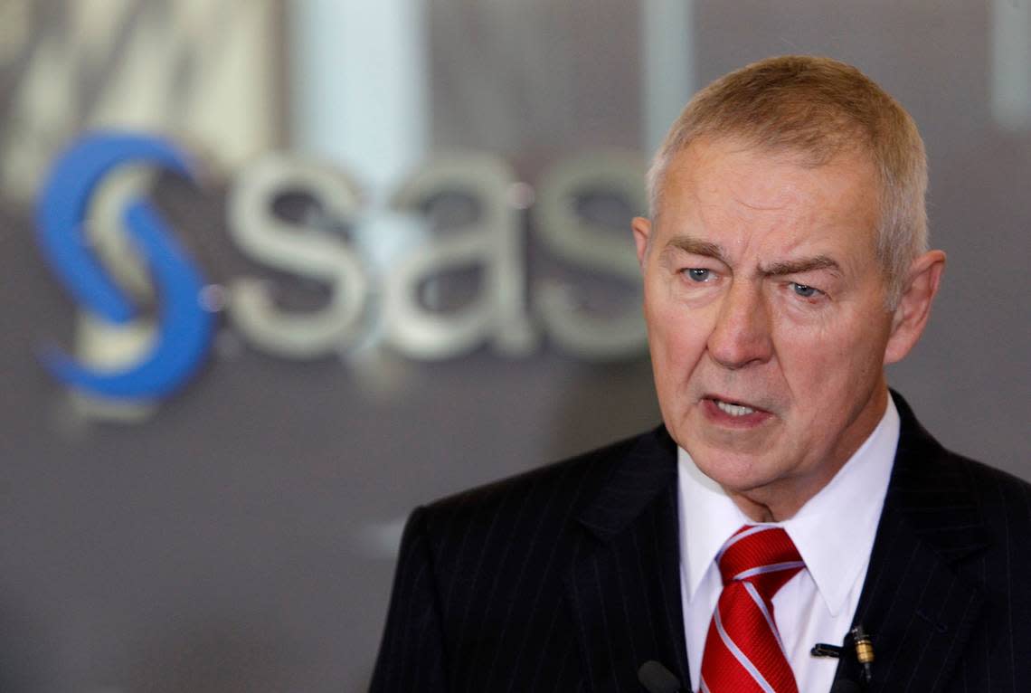 SAS CEO Jim Goodnight speaks to the media at a ceremony dedicating a new building on the SAS campus in Cary on Oct. 21, 2014.