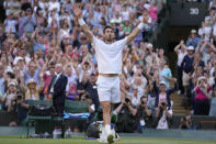 Britain's Cameron Norrie celebrates winning the men's singles quarterfinal match against Belgium's David Goffin at the Wimbledon tennis championships in London, Tuesday July 5, 2022. (AP Photo/Kirsty Wigglesworth)
