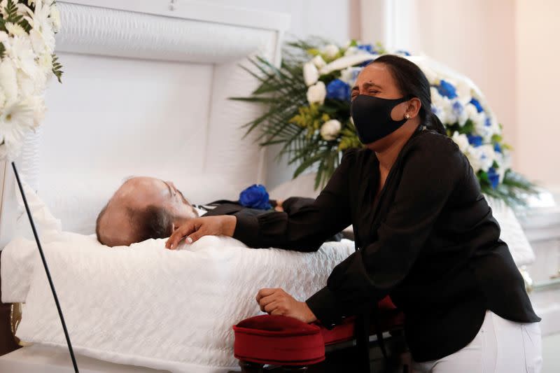 Viewing service of Jose Holguin, 50, who died of complications related to coronavirus disease (COVID-19) in Manhattan, New York City