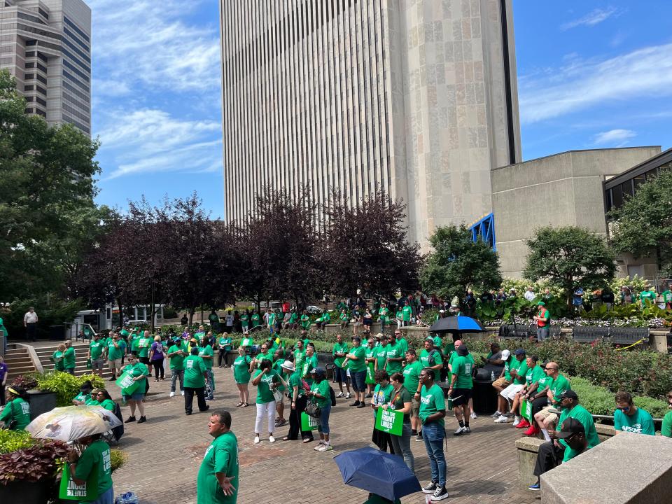 Hundreds of union members sporting their green AFSCME shirts rallied in Sensenbrenner Park Thursday afternoon on the Columbus stop of the national ‘Staff the Front Lines’ bus tour.