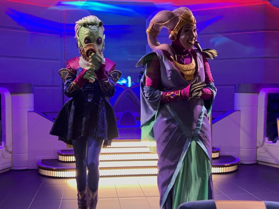 Star Wars characters in costume on galactic starcriuser