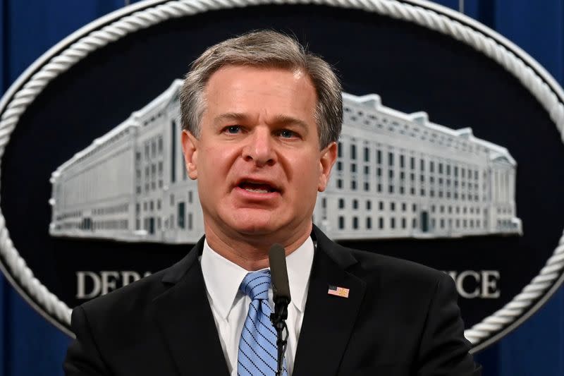 FILE PHOTO: FBI Director Christopher Wray speaks during a press conference on a national security matter at the Department of Justice in Washington