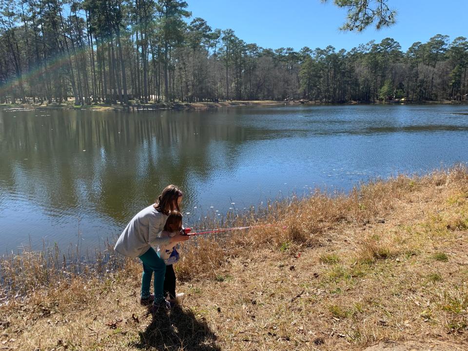 Saba Khonsari's daughters playing at a lake while car camping.