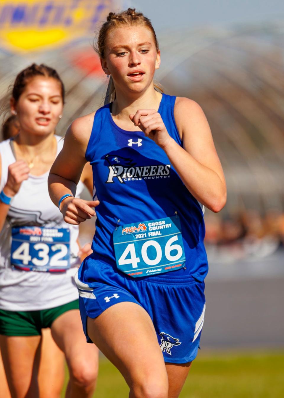 Croswell-Lexington's Morgan Newton heads into the final stretch of the Division 2 girls cross country championship last season. She helped the Pioneers clinch a BWAC title on Oct. 18.