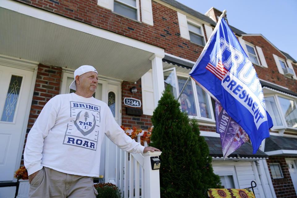 Joe Dowling speaks with an Associated Press reporter outside his home, Wednesday, Sept. 30, 2020, in northeast Philadelphia. Philadelphia has been the cornerstone of Democratic victories in the battleground state — producing Democratic margins so massive that winning statewide has been longshot for most Republicans. But it's a longshot Donald Trump pulled off in 2016 and is trying to repeat again. (AP Photo/Matt Slocum)