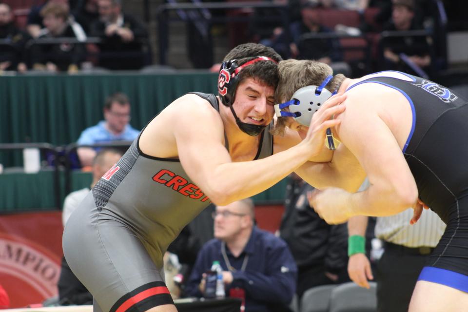 Crestview's Caleb Cunningham wrestles against Harrison Central's Landen Thomas in the Division III 285-pound title match in Columbus.