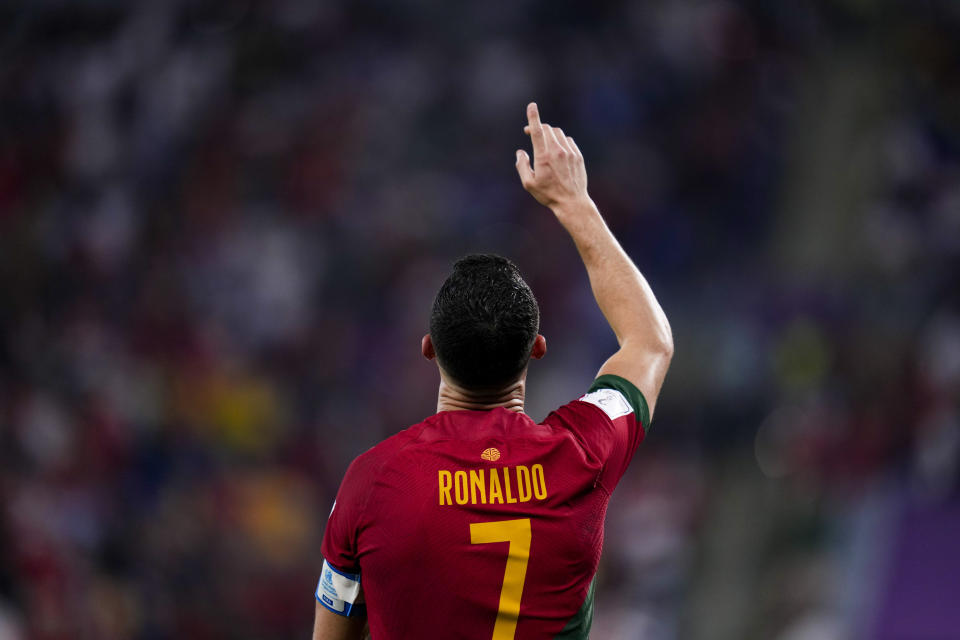 Portugal's Cristiano Ronaldo celebrates after scoring from the penalty spot his side's opening goal against Ghana during a World Cup group H soccer match at the Stadium 974 in Doha, Qatar, Thursday, Nov. 24, 2022. (AP Photo/Manu Fernandez)