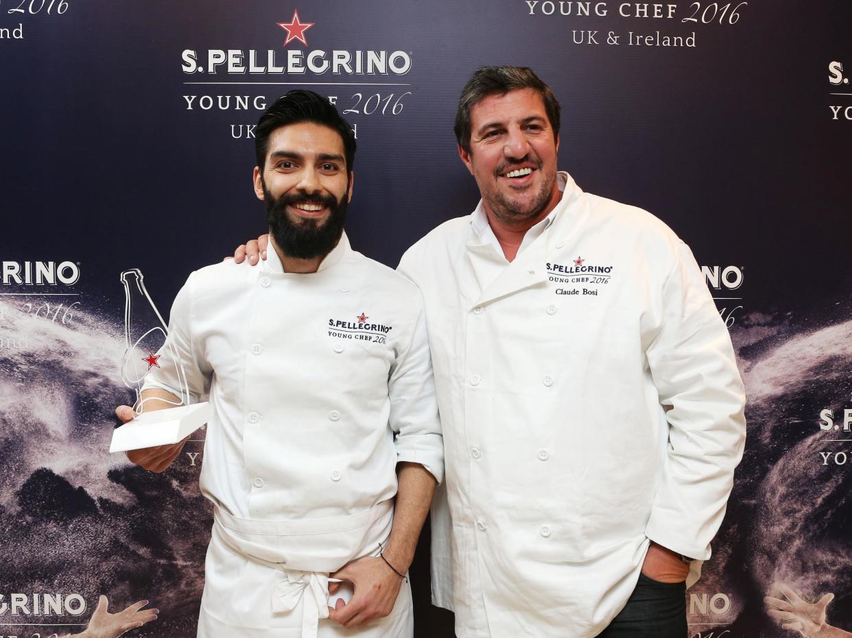 Claude Bosi (right), head judge for the S.Pellegrino UK Ireland Young Chef final, with winner George Kataras: Rex Features