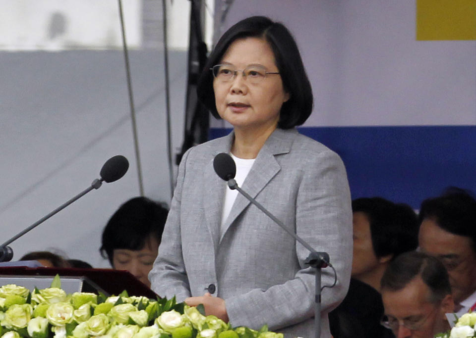 Taiwan President Tsai Ing-wen delivers a speech during National Day celebrations in front of the Presidential Building in Taipei, Taiwan, Wednesday, Oct. 10, 2018. Tsai called on China Wednesday not to be a "source of conflict" and pledged to boost the island's defenses against Beijing's military threats. (AP Photo/Chiang Ying-ying)