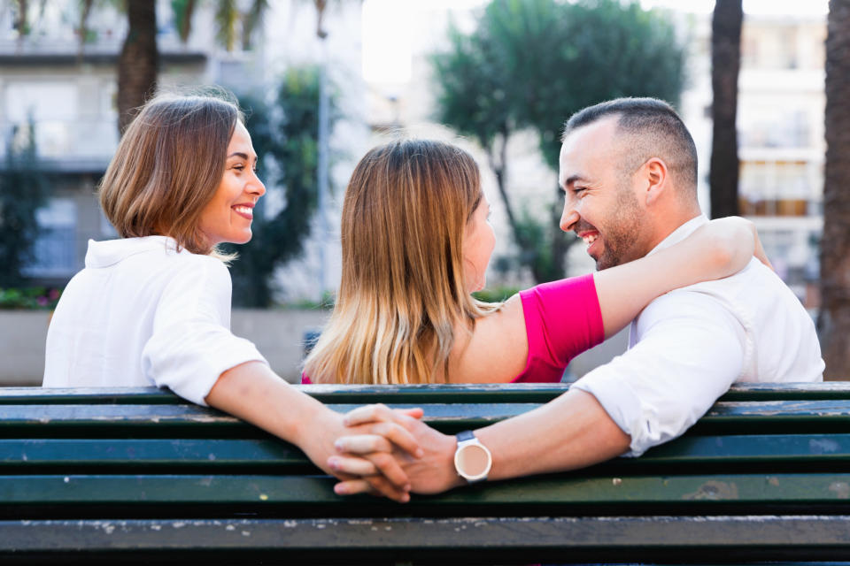 Poly couple laughing with each other