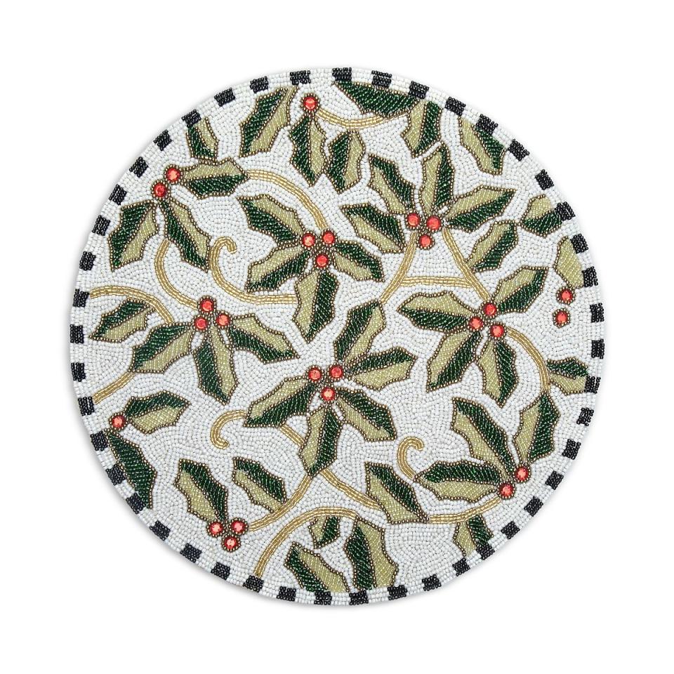 <p>Mackenzie-Childs Farmhouse Holly Beaded Placemat</p><p>bloomingdales.com</p><p>$38.00</p><p><a href="https://go.redirectingat.com?id=74968X1596630&url=https%3A%2F%2Fwww.bloomingdales.com%2Fshop%2Fproduct%2Fmackenzie-childs-farmhouse-holly-beaded-placemat%3FID%3D4467941&sref=https%3A%2F%2Fwww.cosmopolitan.com%2Flifestyle%2Fa42242914%2Fholiday-place-settings%2F" rel="nofollow noopener" target="_blank" data-ylk="slk:Shop Now;elm:context_link;itc:0;sec:content-canvas" class="link ">Shop Now</a></p><span class="copyright">Bloomingdales</span>