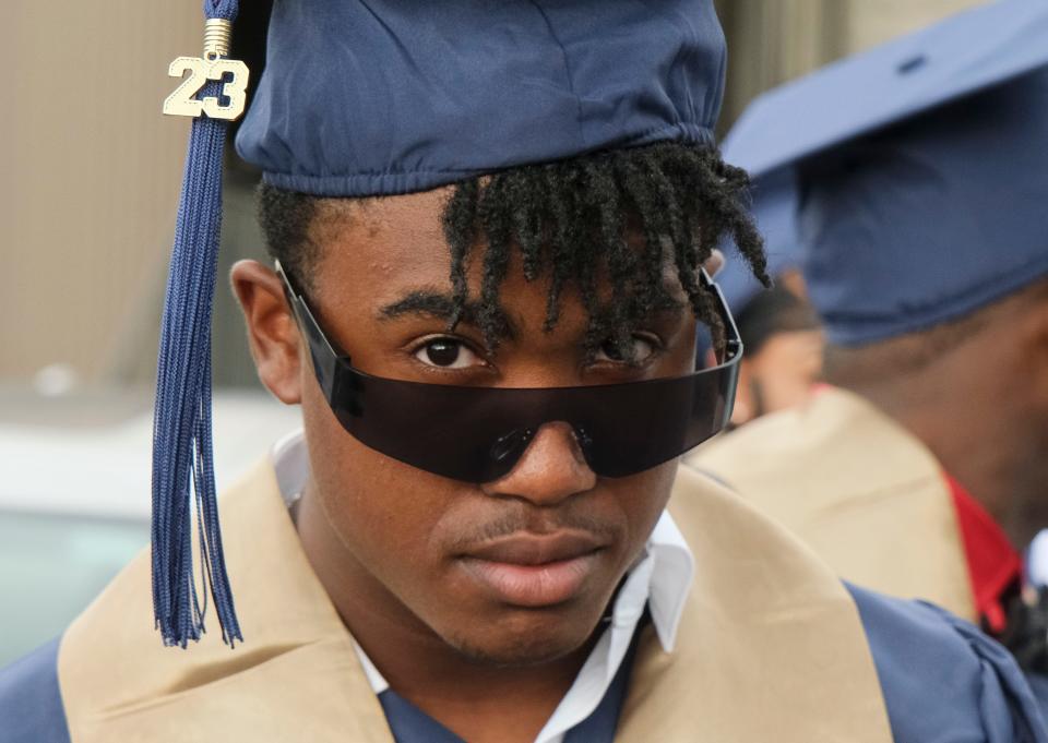 Paul W. Bryant High School presented 227 seniors for graduation Tuesday  at the Tuscaloosa Amphitheater. Kendall Whitson waits in line for the processional.