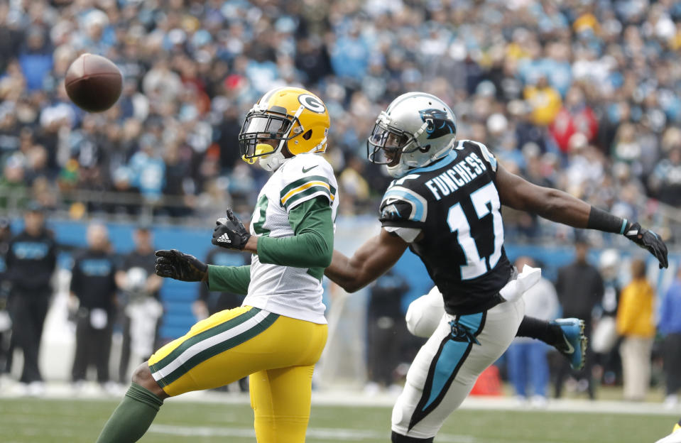 A pass to Carolina Panthers’ Devin Funchess (17) falls incomplete as Green Bay Packers’ Damarious Randall (23) defends during the first half of an NFL football game in Charlotte, N.C., Sunday, Dec. 17, 2017. (AP Photo/Bob Leverone)