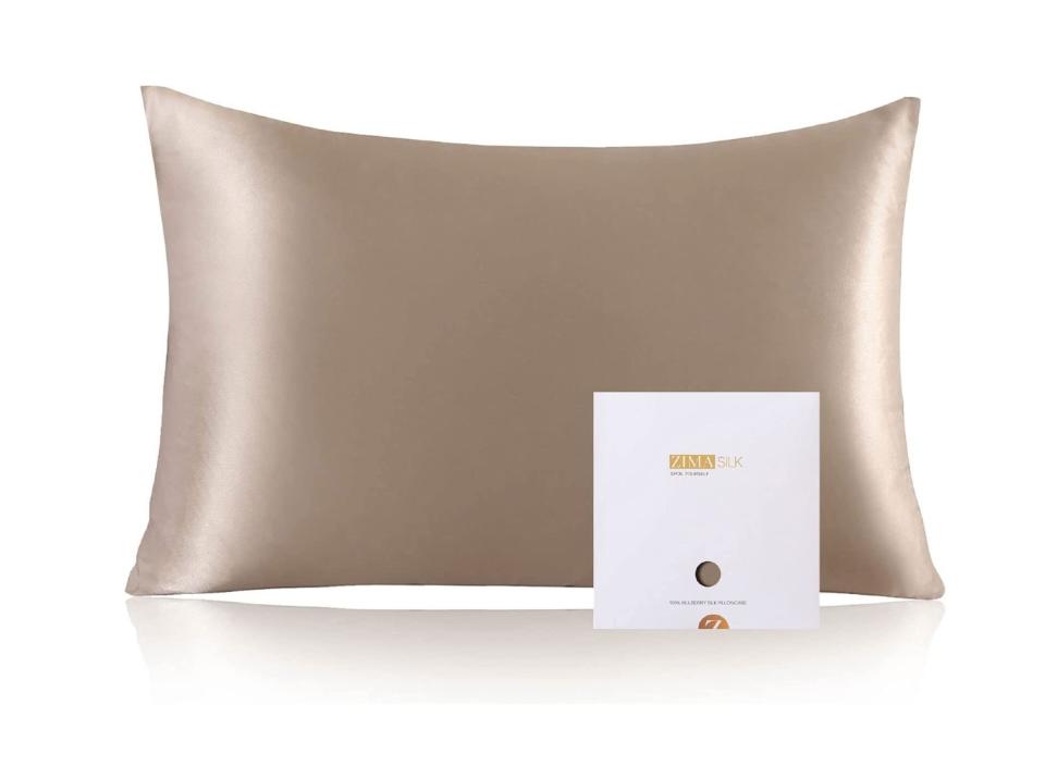 Protect your hair from breakage while you sleep with this silk pillowcase. (Source: Amazon)