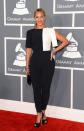 It seems that Beyoncé is taking the infamous <a href="http://ca.music.yahoo.com/blogs/awards/cbs-warns-grammy-performers-lay-off-bare-skin-190926034.html" data-ylk="slk:Grammy memo;elm:context_link;itc:0;sec:content-canvas;outcm:mb_qualified_link;_E:mb_qualified_link;ct:story;" class="link  yahoo-link">Grammy memo</a> to heart. The sexy Superbowl halftime singer surprises everyone by covering up her curves in a black and white colour block pantsuit. We hope this become a new trend! (Photo by Jason Merritt/Getty Images)