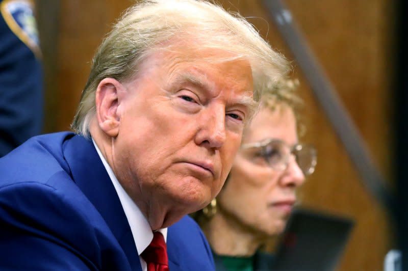 Former President Donald Trump appears with his lawyer Susan Necheles for a pretrial hearing in his criminal case on charges stemming from hush-money paid to an adult film star in New York City on Monday. Pool Photo by Spencer Platt/UPI