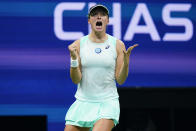 Iga Swiatek, of Poland, reacts after defeating Aryna Sabalenka, of Belarus, during the semifinals of the U.S. Open tennis championships, Thursday, Sept. 8, 2022, in New York. (AP Photo/Frank Franklin II)