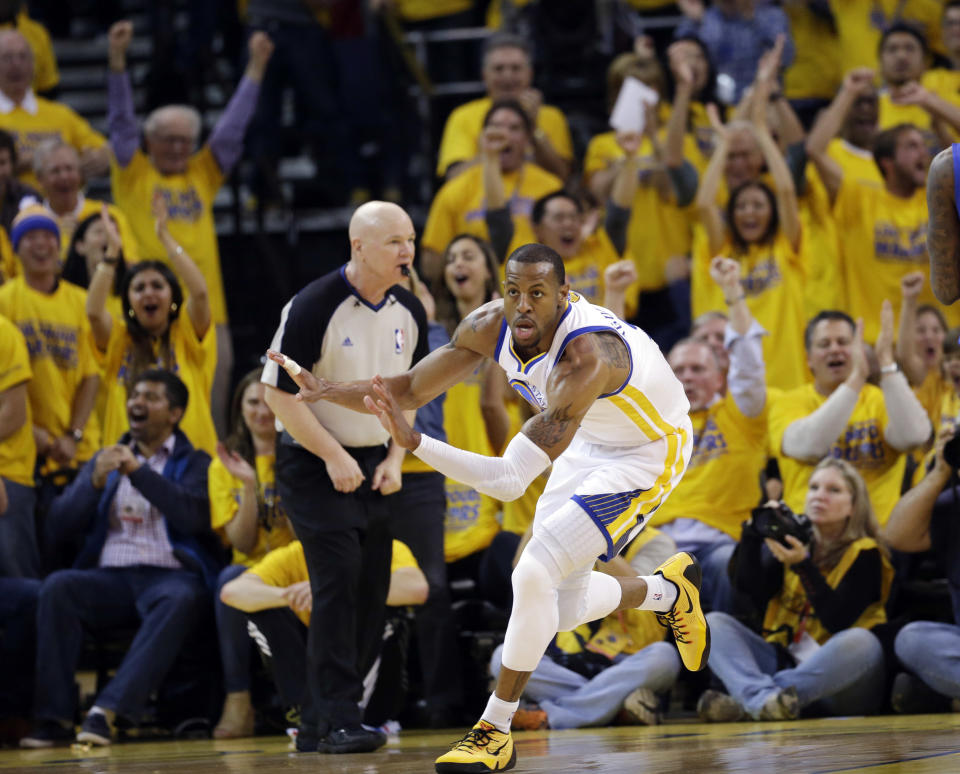 Golden State Warriors' Andre Iguodala celebrates after scoring against the Los Angeles Clippers during the first half in Game 4 of an opening-round NBA basketball playoff series on Sunday, April 27, 2014, in Oakland, Calif. (AP Photo/Marcio Jose Sanchez)