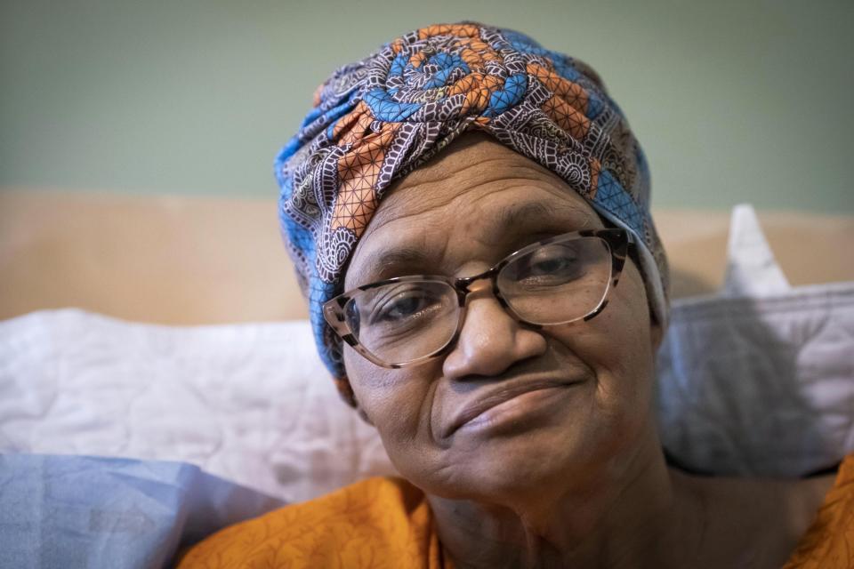 Constance Guthrie, affectionately known to friends as "CG" or "Connie," listens as her daughter, Jessica Guthrie, sings to her in Fredericksburg, Va., on Tuesday, Sept. 20, 2022. (AP Photo/Wong Maye-E)