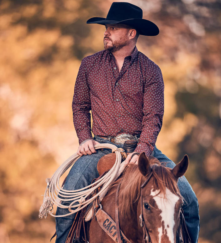 <p><a href="https://go.redirectingat.com?id=74968X1596630&url=https%3A%2F%2Fwww.wrangler.com%2Fshop%2Fmens-cody-johnson-one-pocket-button-down-shirt-in-burgundy-flower-112357673.html%3FmerchCategory%3DWRG_MEN_COLLECTIONS_CODY_JOHNSON&sref=https%3A%2F%2Fwww.countryliving.com%2Fshopping%2Fa62068493%2Fcody-johnson-wrangler%2F" data-i13n="elm:affiliate_link;elmt:premonetized" rel="sponsored" target="_blank" data-ylk="slk:Shop Now;elm:affiliate_link;elmt:premonetized;itc:0;sec:content-canvas" class="link rapid-noclick-resp rapid-with-clickid etailiffa-link">Shop Now</a></p> <p>Cody Johnson Shirt in Burgundy Flower</p> <p>wrangler.com</p> <p>$59.99</p><span class="copyright">Wrangler</span>