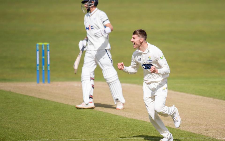 Glamorgan's Callum Taylor celebrates dismissing Yorkshire's Joe Root - Allan McKenzie/SWpix.com /https://www.swpix.com 