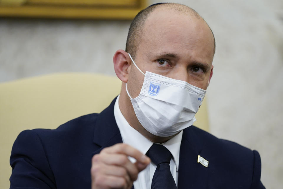 Israeli Prime Minister Naftali Bennett speaks as he meets with President Joe Biden in the Oval Office of the White House, Friday, Aug. 27, 2021, in Washington. (AP Photo/Evan Vucci)