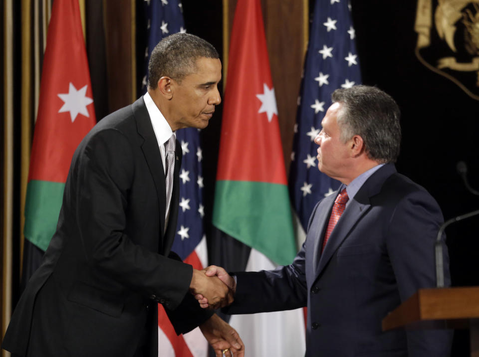 In this March 22, 2013, file photo, President Barack Obama, left, and Jordan's King Abdullah II shake hands following their joint new conference at the King's Palace in Amman, Jordan.