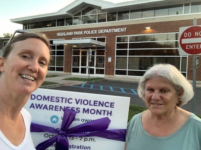 Members of Women Aware's Highland Park Domestic Violence Response Team (DVRT) raise awareness during Domestic Violence Awareness Month. The state-designated lead domestic violence agency for Middlesex County, Women Aware moves approximately 2,000 survivors beyond abuse each year.