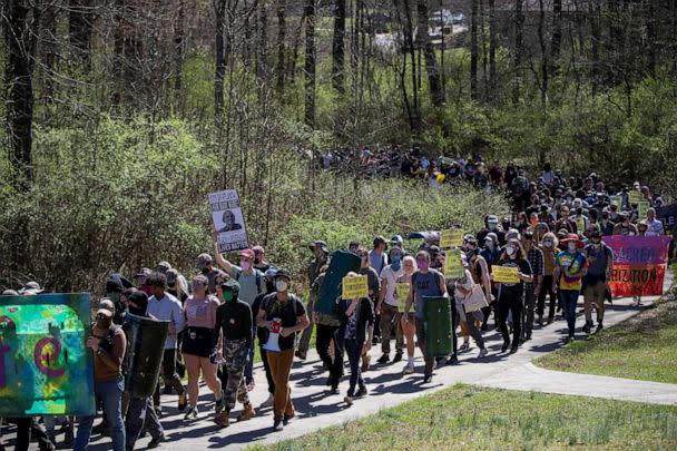 PHOTO: People protest against the building of a public safety training facility during a Defend the Atlanta Forest march on the South River Trail in Atlanta, Georgia, on March 4, 2023. (Alyssa Pointer/Reuters)