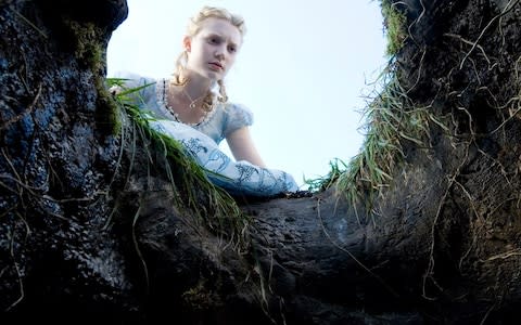 Mia Wasikowska on the set of Tim Burton's Alice In Wonderland. - Credit:  Leah Gallo/Film Stills 