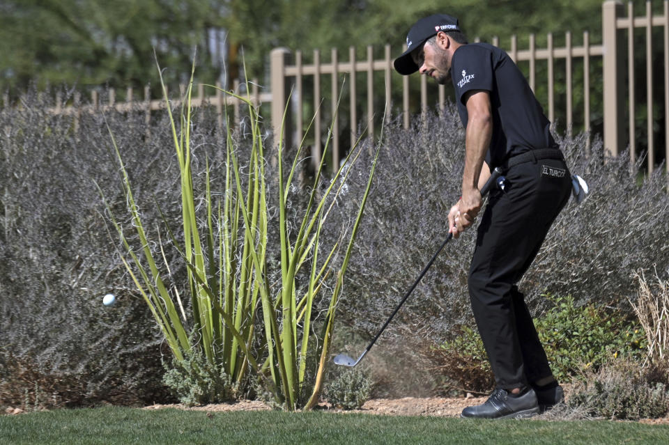 Abraham Ancer, of Mexico, watches his shot from the rough on the fifth hole during final round of the CJ Cup golf tournament, Sunday, Oct. 17, 2021, in Las Vegas. (AP Photo/David Becker)
