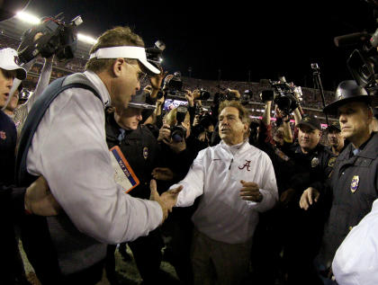 Alabama's Nick Saban and Auburn's Gus Malzahn shake hands after the Crimson Tide's win. (USAT)