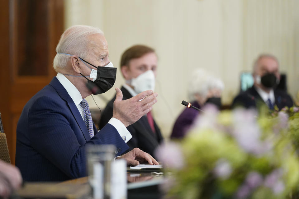 President Joe Biden speaks as he meets with Japanese Prime Minister Yoshihide Suga in the State Dining Room of the White House, Friday, April 16, 2021, in Washington. (AP Photo/Andrew Harnik)