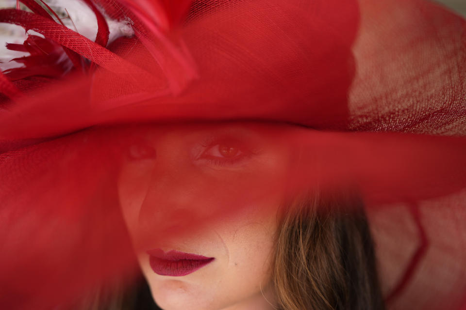 A race fan walks though the stands at Churchill Downs before the 150th running of the Kentucky Derby horse race Saturday, May 4, 2024, in Louisville, Ky. (AP Photo/Brynn Anderson)