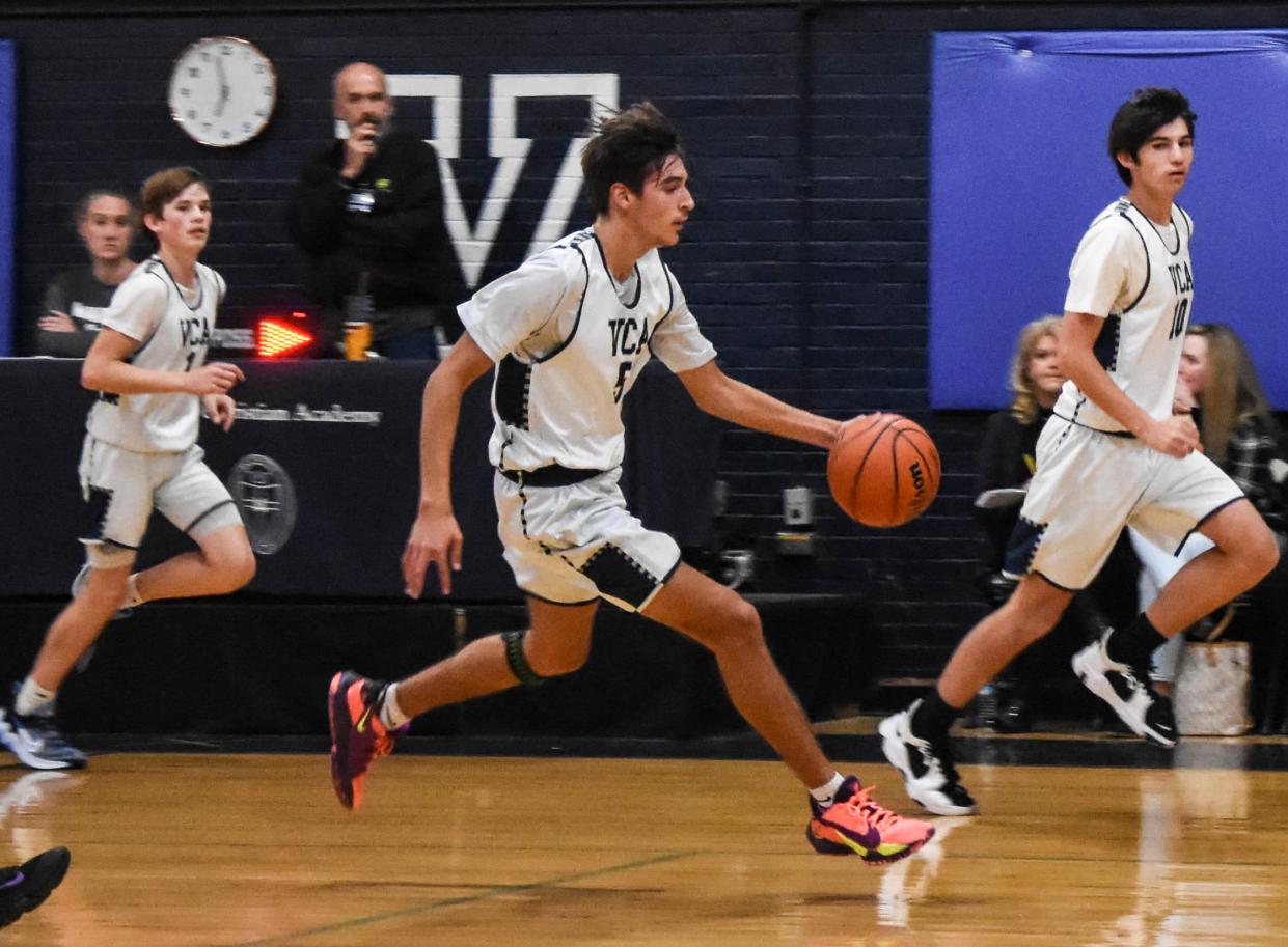 Veritas Christian senior Aldric McMahan dribbles down the court during a recent game at Veritas.