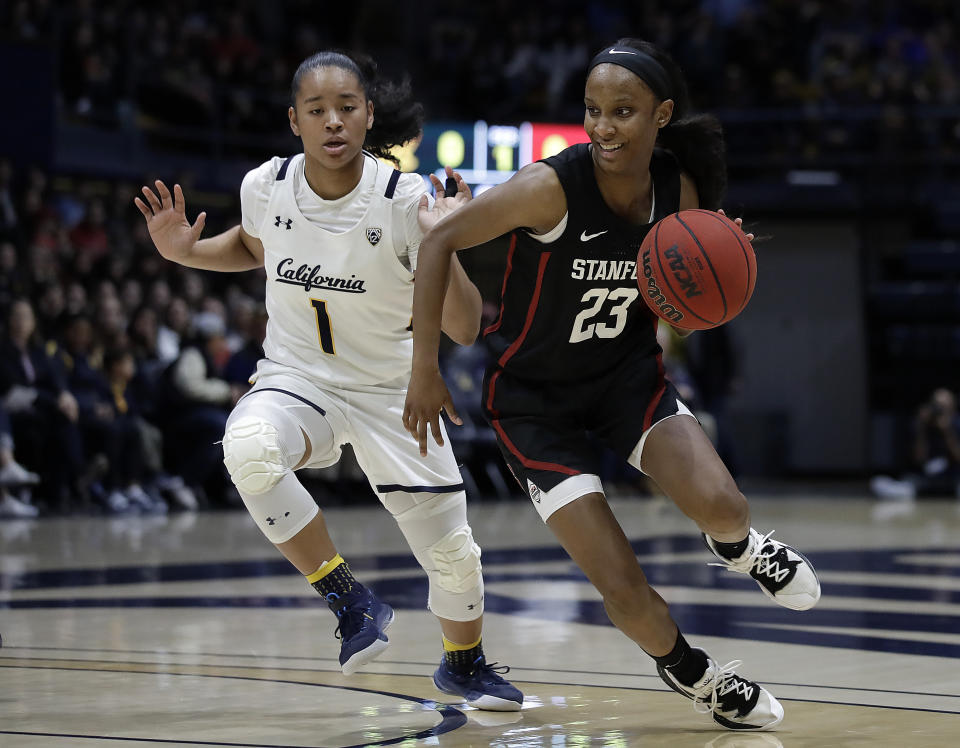 Stanford's Kiana Williams, right, drives the ball past California's Leilani McIntosh (1) in the first half of an NCAA college basketball game Sunday, Jan. 12, 2020, in Berkeley, Calif. (AP Photo/Ben Margot)