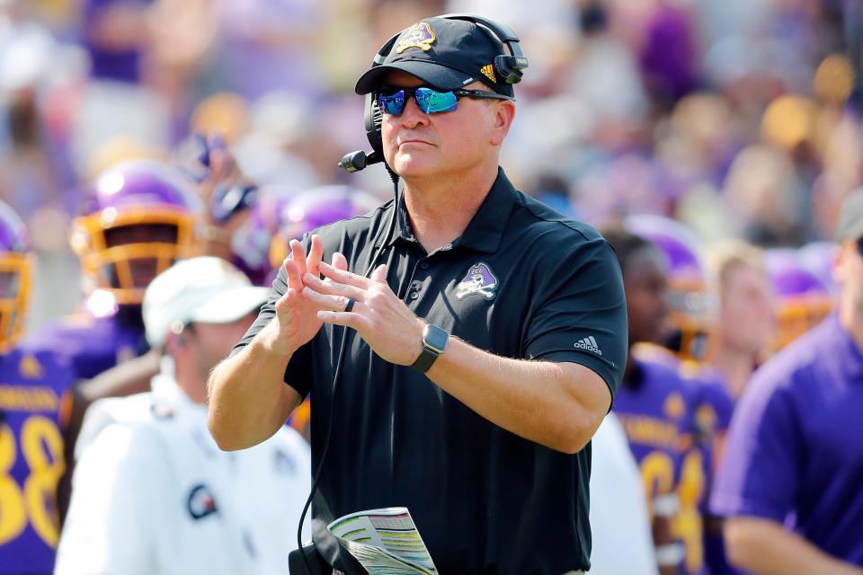 East Carolina head coach Mike Houston calls time out against the South Carolina during the second half of an NCAA college football game in Greenville, N.C., Saturday, Sept. 11, 2021.