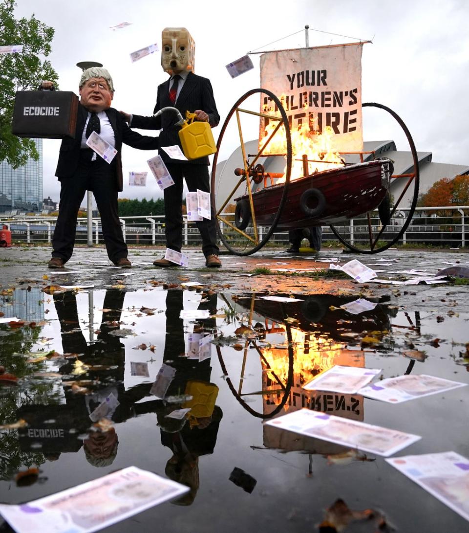 The protest was staged across the river from the Cop26 venue (Andrew Milligan/PA) (PA Wire)