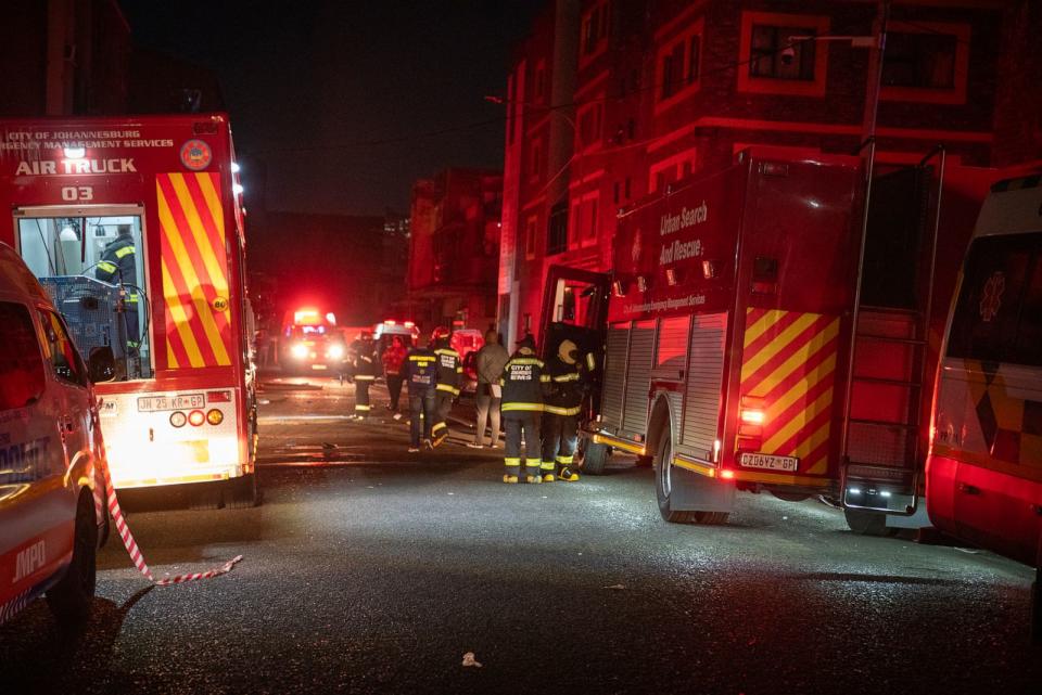 PHOTO: Firefighters work on the scene of a deadly blaze that claimed the lives of dozens of people in Johannesburg, South Africa, on Aug. 31, 2023. (AP)