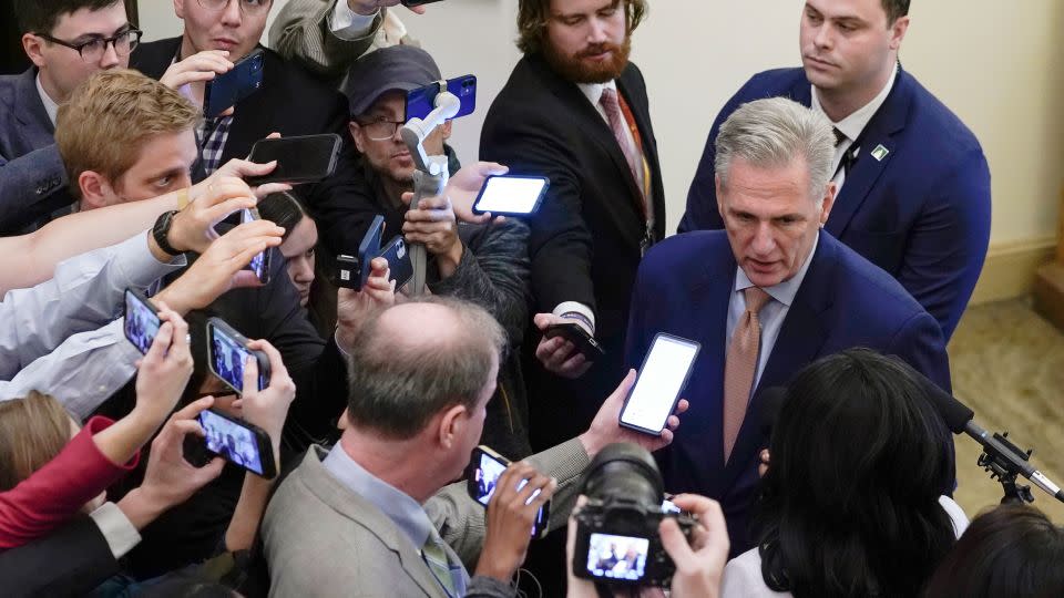 Former House Speaker Kevin McCarthy talks with reporters at the Capitol on October 12, 2023. - Mariam Zuhaib/AP