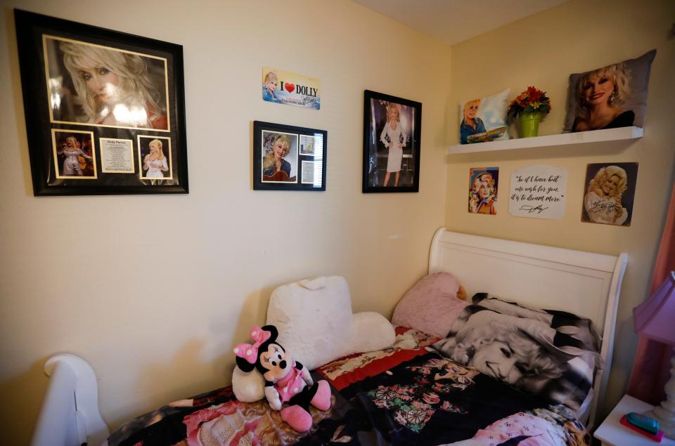 Jackie Carroll's room is filled with Dolly Parton memorabilia.