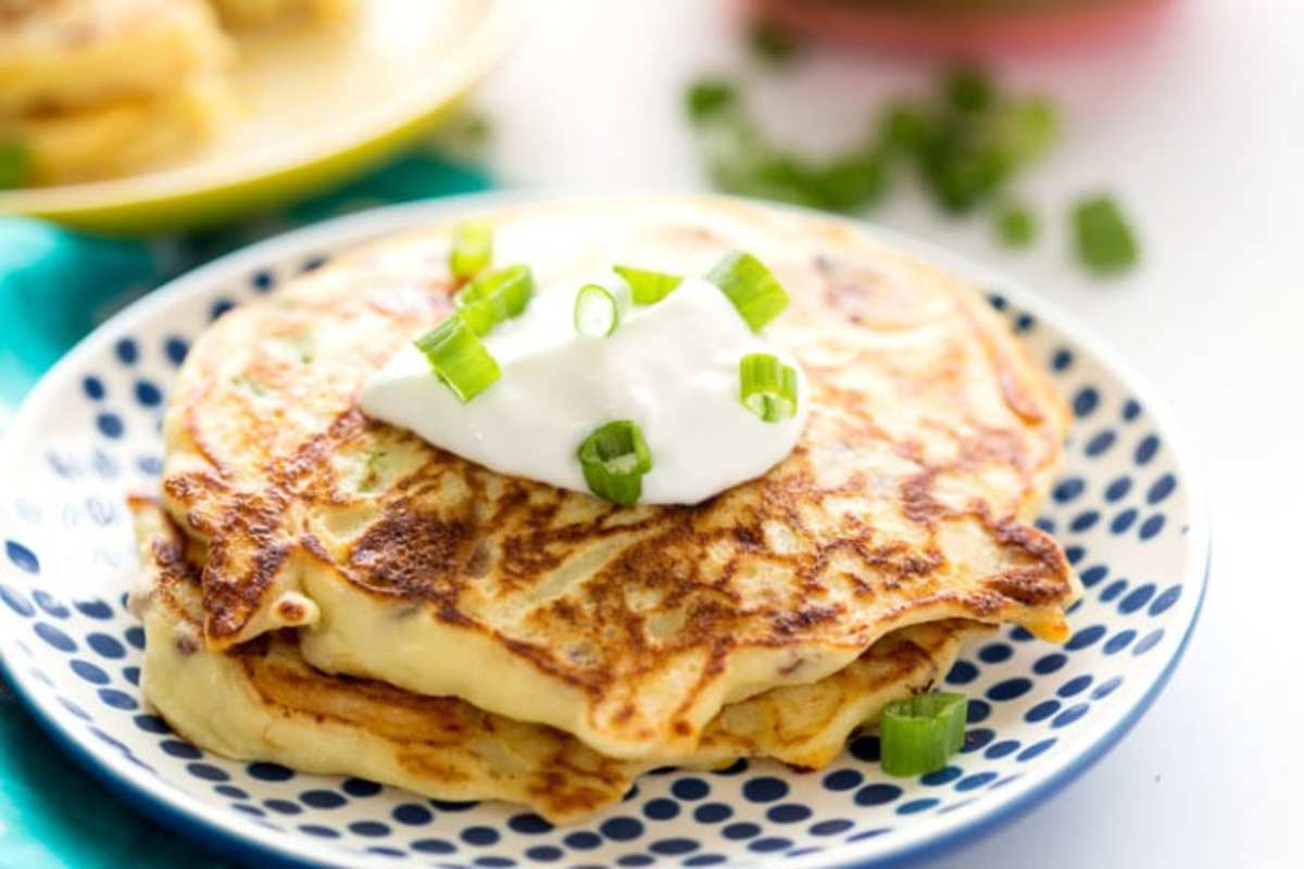 <p>Eazy Peazy Mealz</p><p>Savory bacon, chive, and cheddar cheese ricotta pancakes make a great savory start to the day!</p><p><strong>Get the recipe: <a href="https://www.eazypeazymealz.com/savory-bacon-cheddar-chive-ricotta-pancakes/" rel="nofollow noopener" target="_blank" data-ylk="slk:Savory Bacon Chive and Cheddar Ricotta Pancakes;elm:context_link;itc:0;sec:content-canvas" class="link rapid-noclick-resp"><em>Savory Bacon Chive and Cheddar Ricotta Pancakes</em></a></strong></p><p><strong>Related: <a href="https://parade.com/food/ice-cube-tray-recipes" rel="nofollow noopener" target="_blank" data-ylk="slk:Ice-Cube Tray Recipes For Pancakes and More;elm:context_link;itc:0;sec:content-canvas" class="link rapid-noclick-resp">Ice-Cube Tray Recipes For Pancakes and More</a></strong></p>