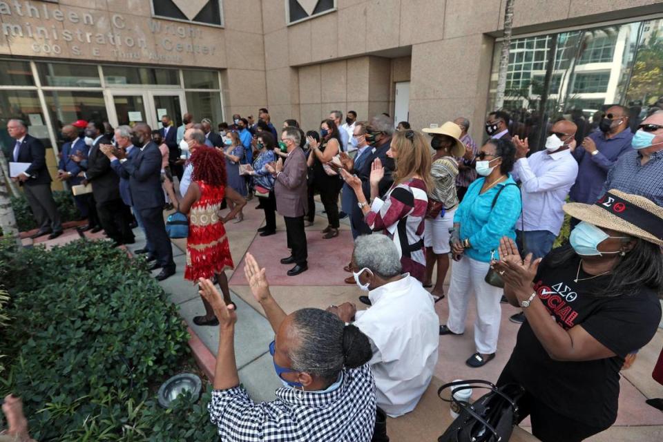 Supporters of Broward Public Schools Superintendent Robert Runcie applaud during a rally held at the Broward County Public Schools Administration building in Fort Lauderdale on Friday, April 23, 2021. Runcie was arrested this week and charged with felony perjury in grand jury proceedings.